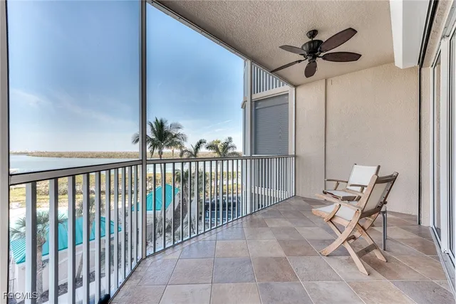 a bedroom with bed and a couch