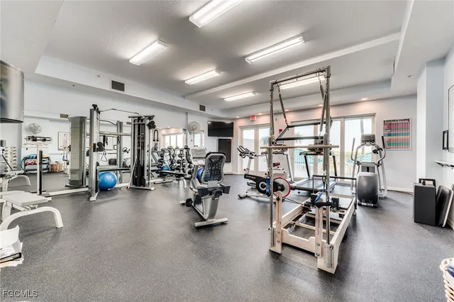 an aerial view of residential houses with outdoor space and swimming pool