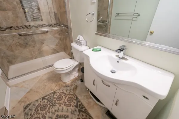 a bathroom with a sink and a toilet