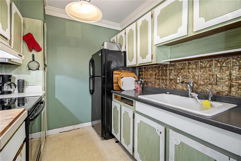 2367 Henderson Mill Road, Unit 8 Atlanta, GA 30345 - Photo 11 of 35 a utility room with sink dryer and washer