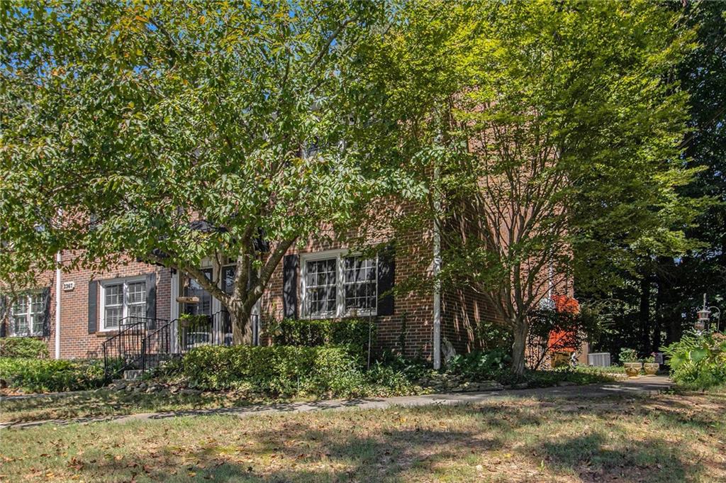2367 Henderson Mill Road, Unit 8 Atlanta, GA 30345 - Photo 34 of 35 a view of street along with trees
