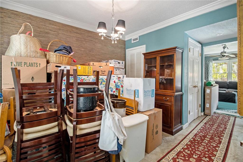 2367 Henderson Mill Road, Unit 8 Atlanta, GA 30345 - Photo 7 of 35 a view of a room with gym equipment