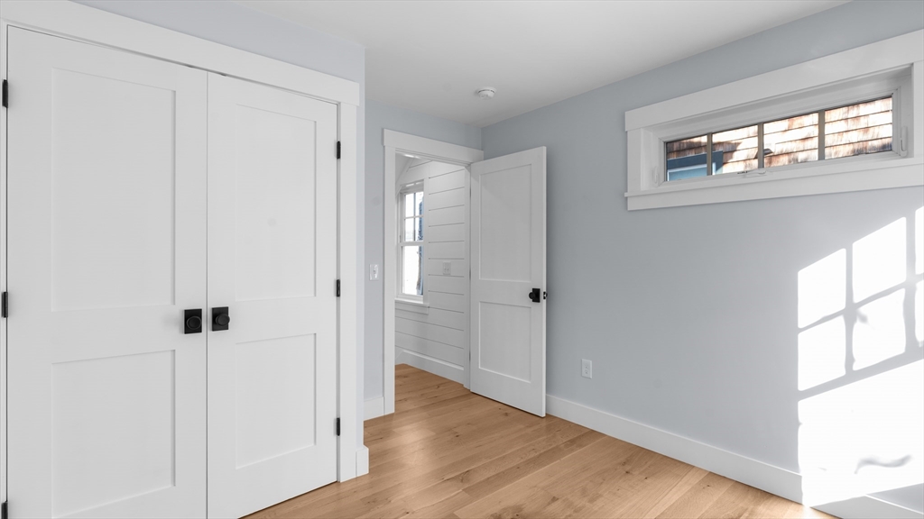 39 Connection Street Newport, RI 02840 - Photo 13 of 40 a view of a bathroom with wooden floor and a window