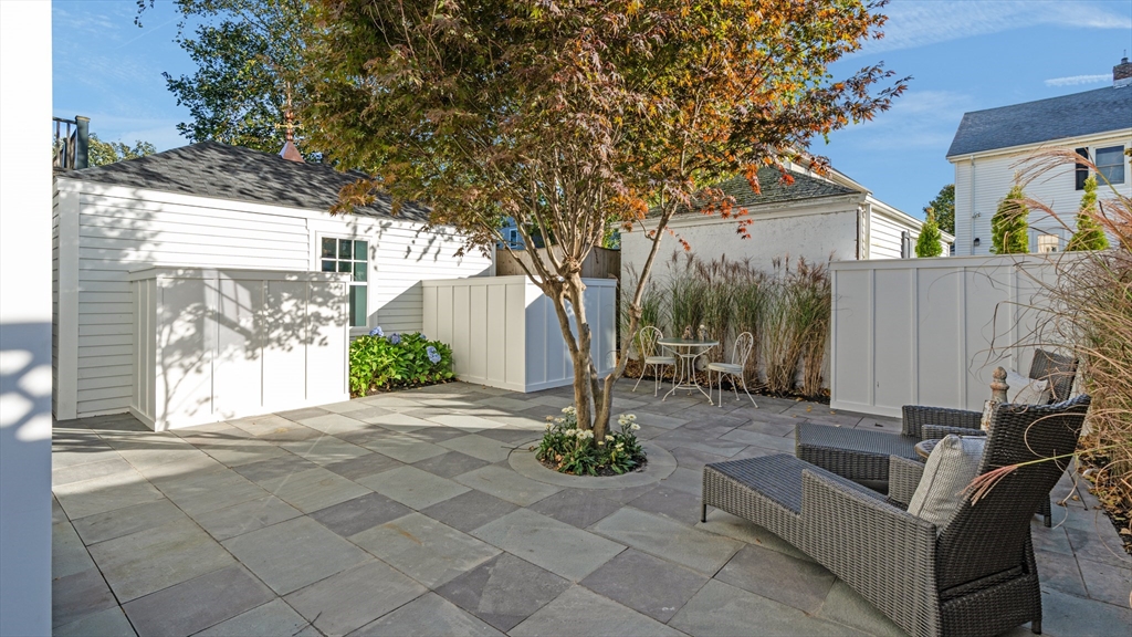 39 Connection Street Newport, RI 02840 - Photo 25 of 40 a view of a house with backyard and sitting area