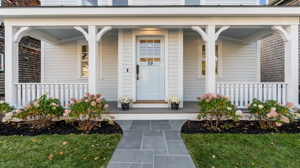 39 Connection Street Newport, RI 02840 - Photo 38 of 40 a front view of a house with a garden