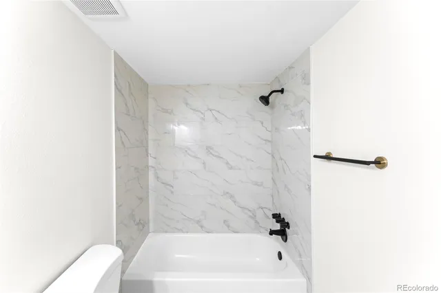 a bathroom with a bathtub