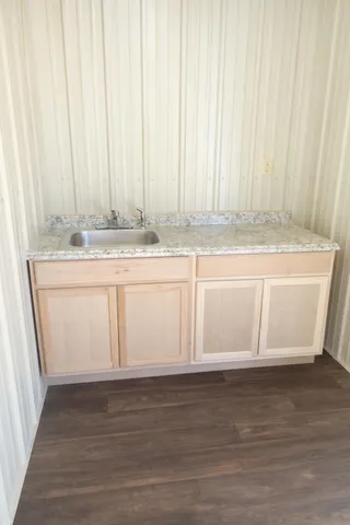 a bathroom with a shower and a toilet