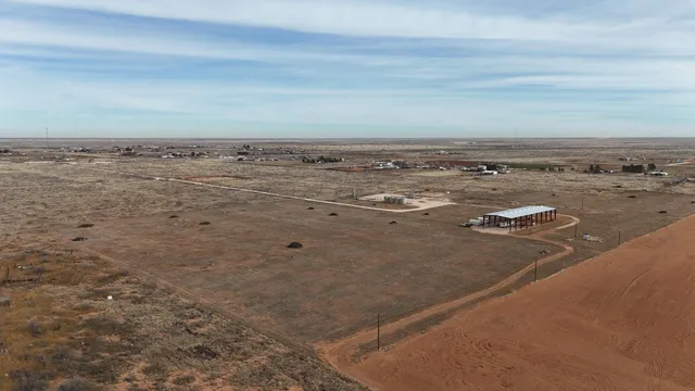 a view of a big yard with wooden floor