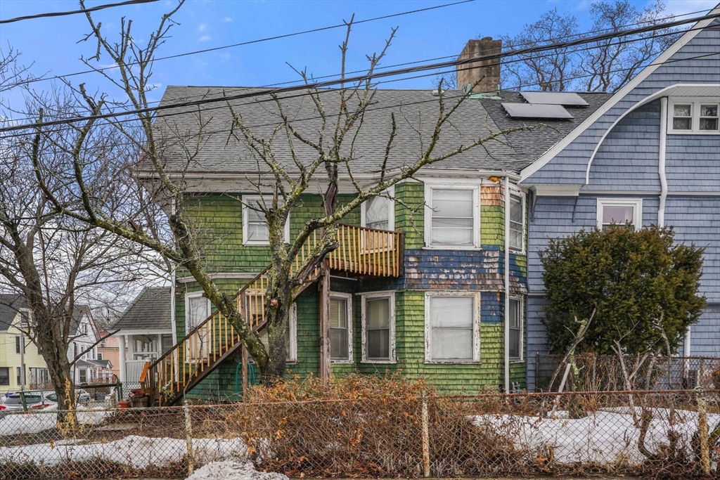 1 Copley Street Boston, MA 02119 - Photo 6 of 29 a view of a house with a tree
