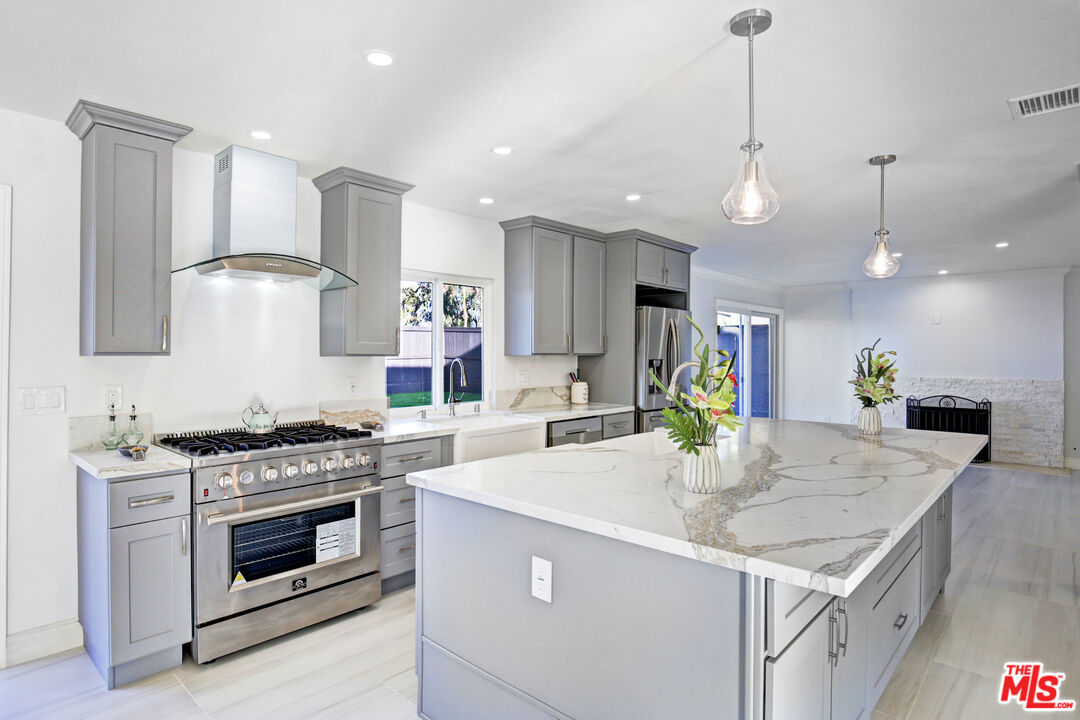 33051 Daniel Drive Dana Point, CA 92629 - Photo 2 of 30 a kitchen with a stove and a sink