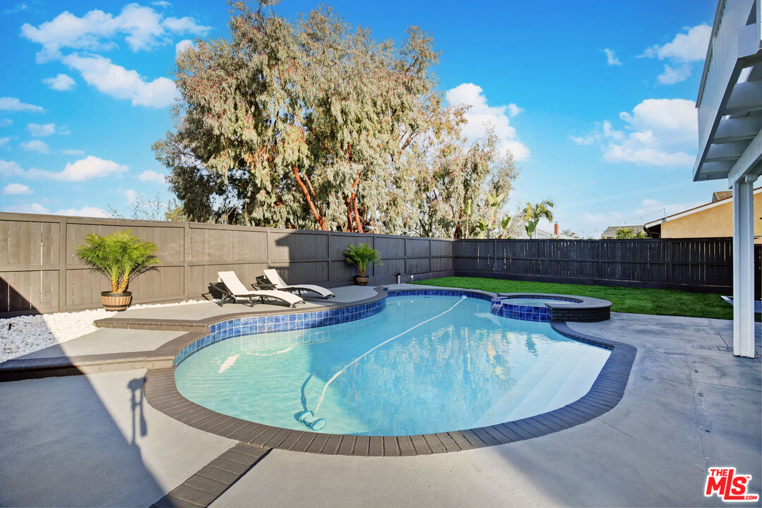 33051 Daniel Drive Dana Point, CA 92629 - Photo 28 of 30 a view of a swimming pool with a yard and furniture