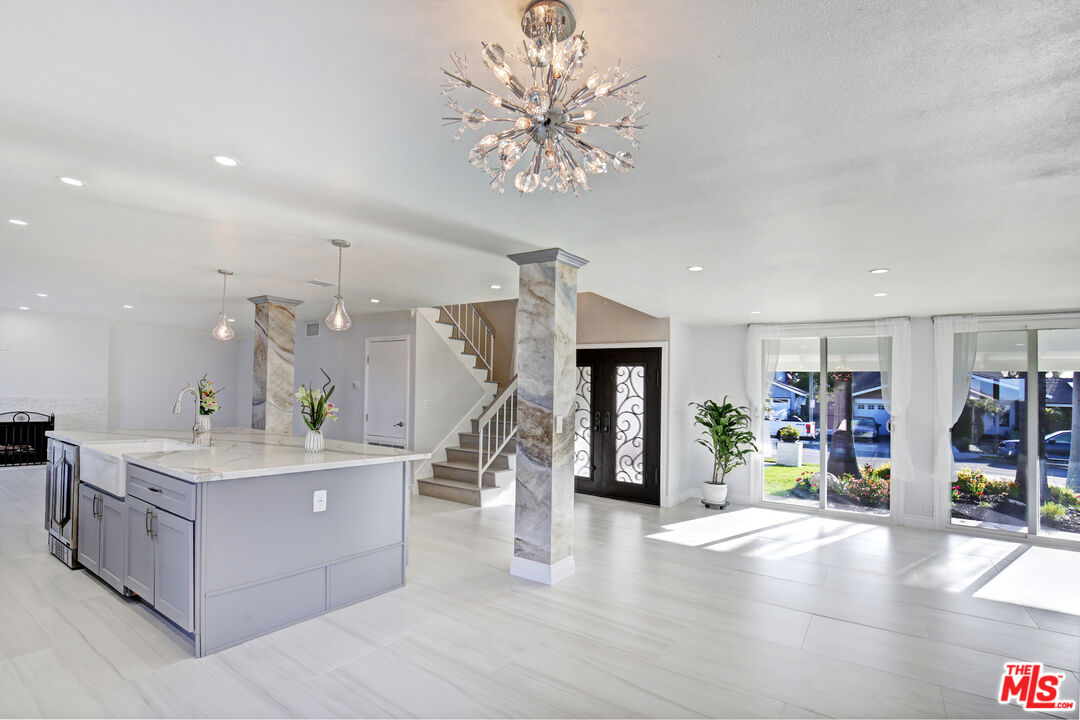 33051 Daniel Drive Dana Point, CA 92629 - Photo 3 of 30 a living room with fireplace furniture and a wooden floor