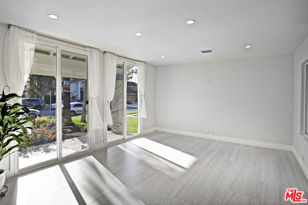 33051 Daniel Drive Dana Point, CA 92629 - Photo 5 of 30 wooden floor in an empty room with a window