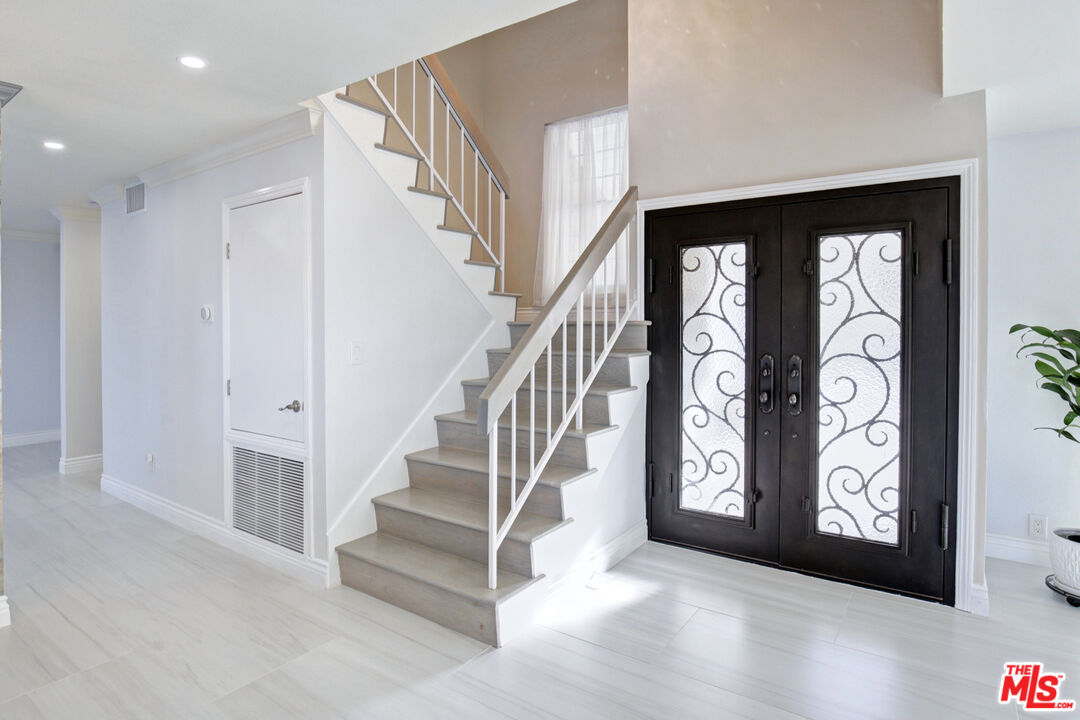 33051 Daniel Drive Dana Point, CA 92629 - Photo 7 of 30 a view of entryway and hall with wooden floor