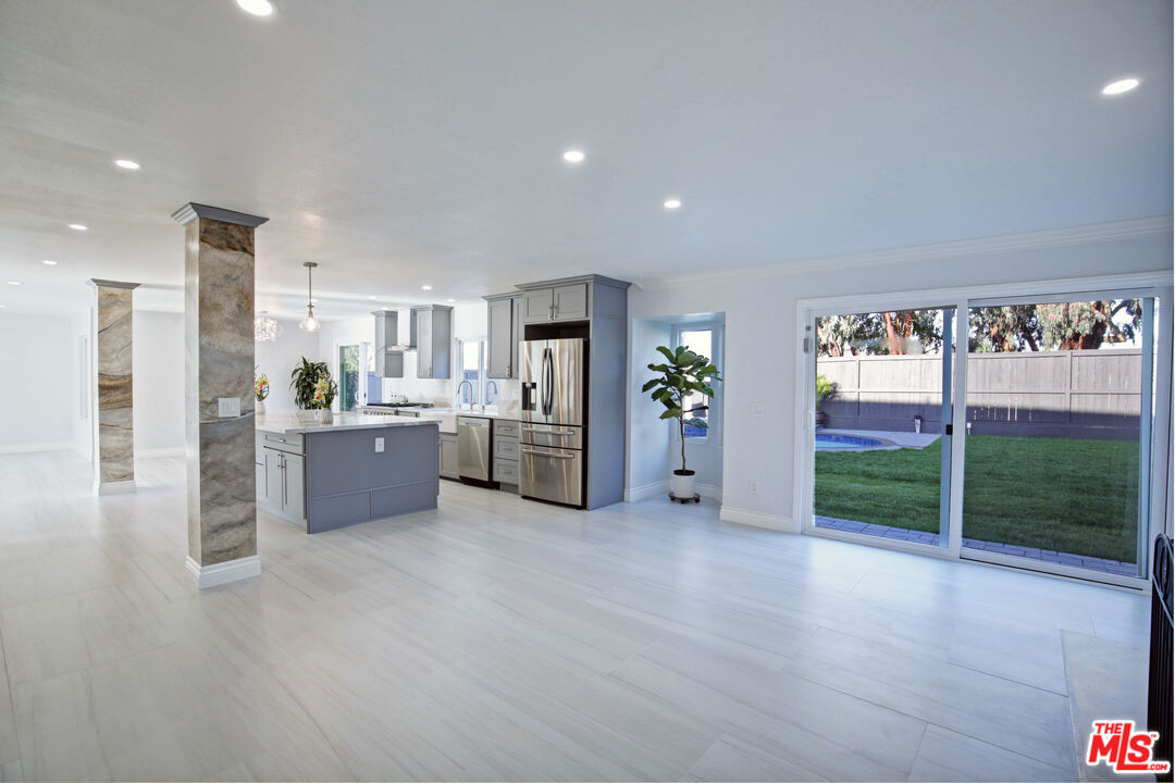 33051 Daniel Drive Dana Point, CA 92629 - Photo 8 of 30 a view of a kitchen with refrigerator and wooden floor