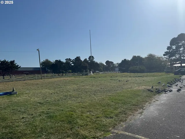 a view of a garden with a building