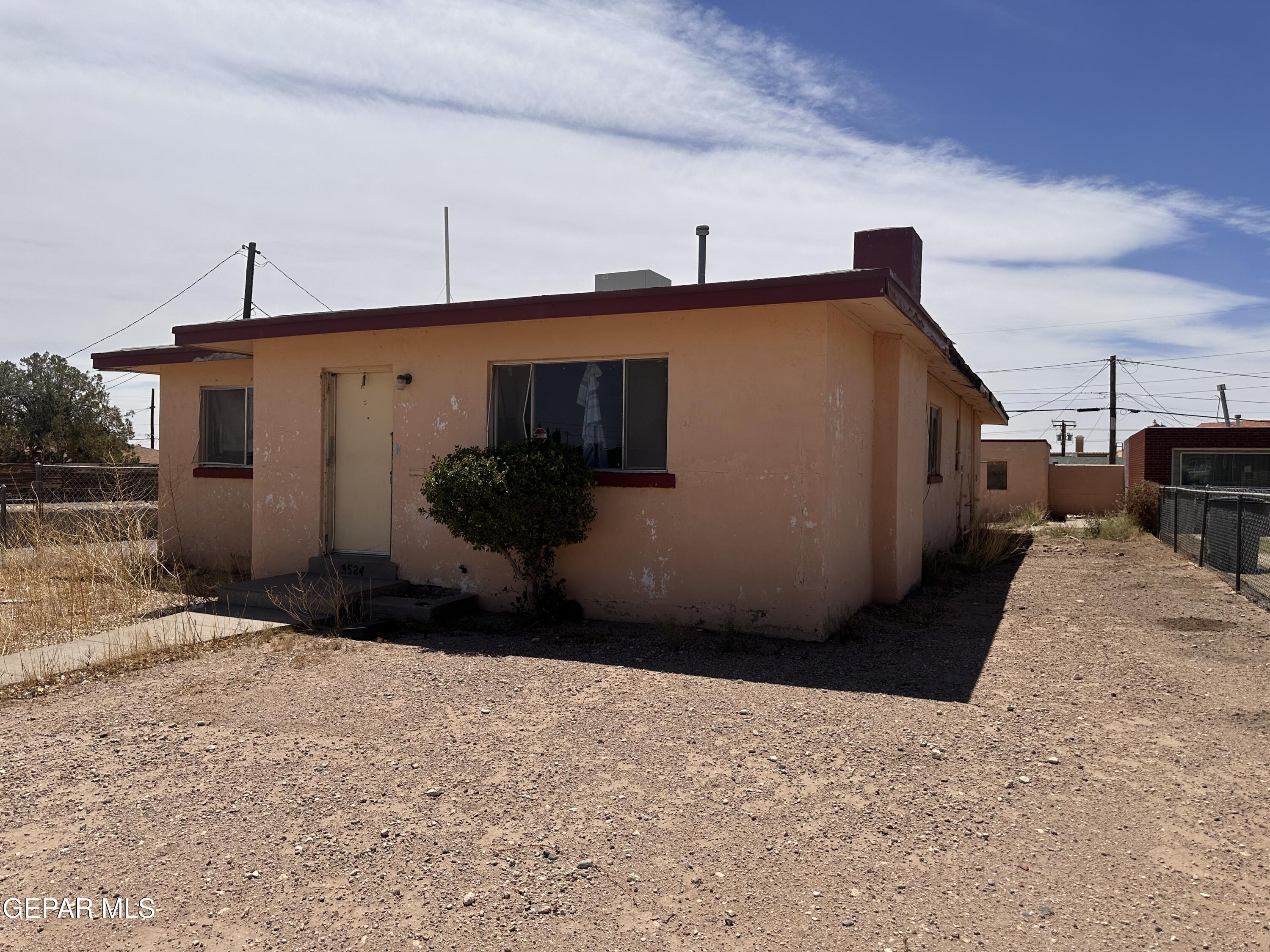 9220 Raleigh Drive El Paso, TX 79924 - Photo 2 of 6 a house view with a backyard space