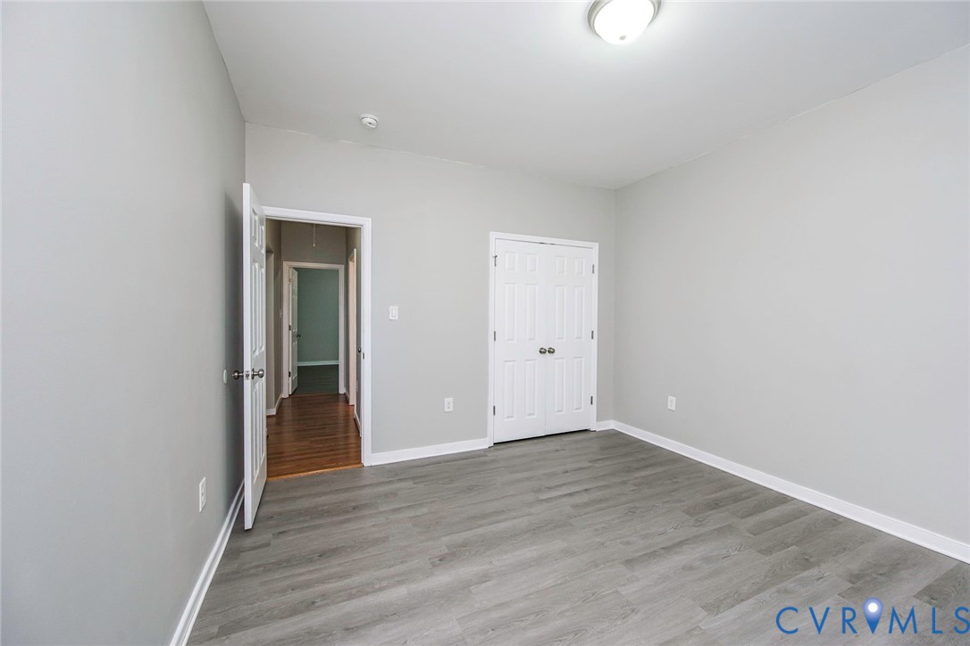 1297 Manfield Road Aylett, VA 23009 - Photo 25 of 41 wooden floor in an empty room