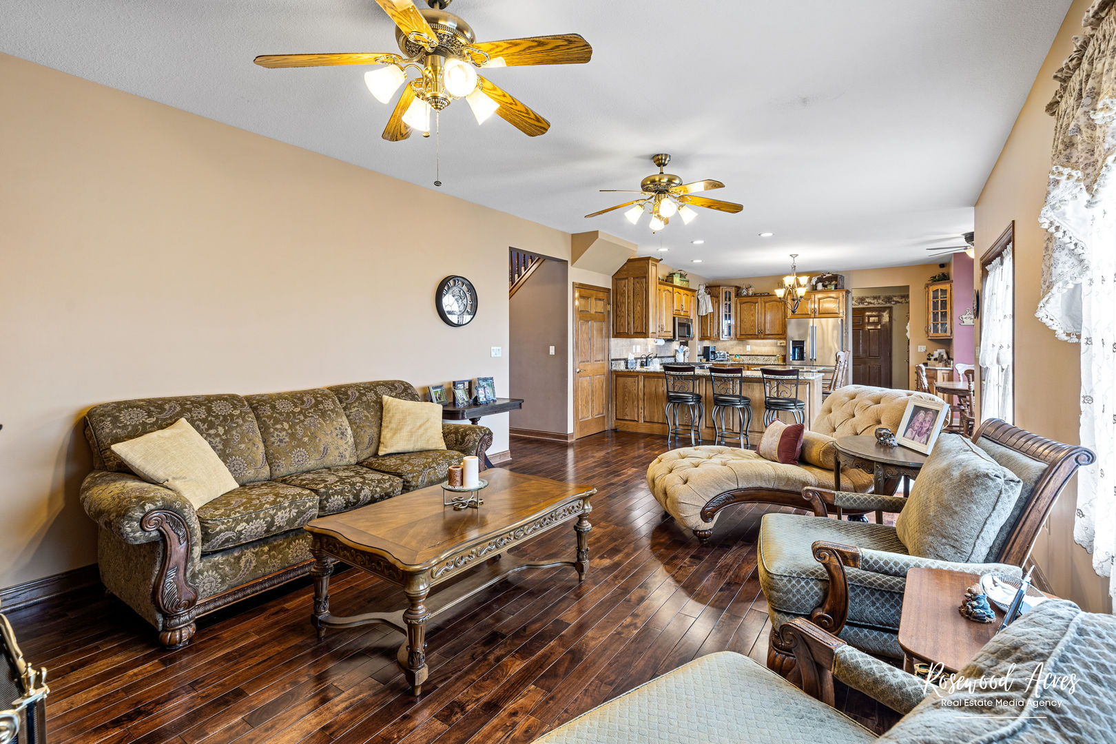 2021 Wiley Ridge Road Kankakee, IL 60901 - Photo 12 of 32 a living room with furniture a chandelier and a dining table