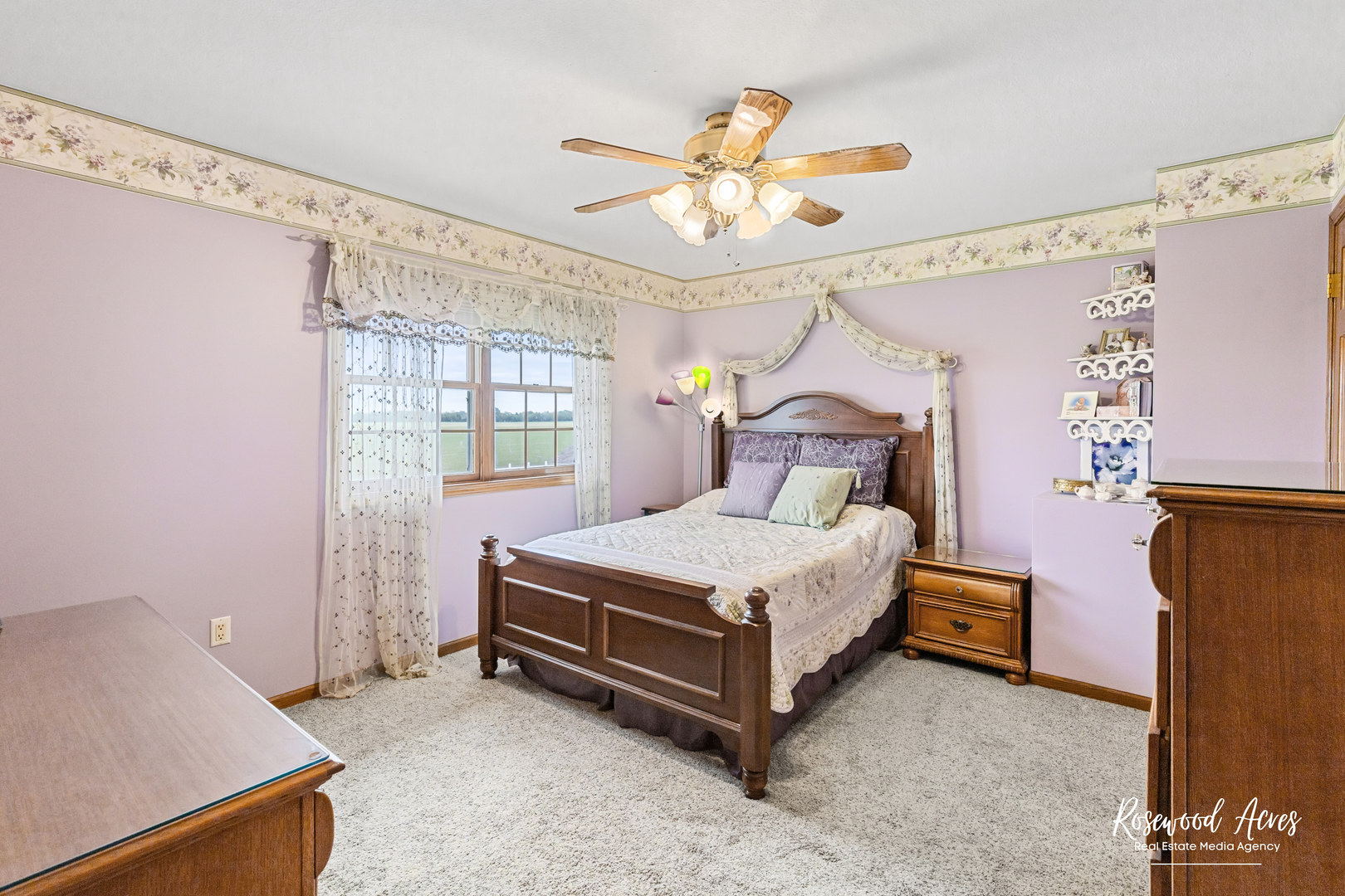2021 Wiley Ridge Road Kankakee, IL 60901 - Photo 24 of 32 a bedroom with a bed and a chandelier