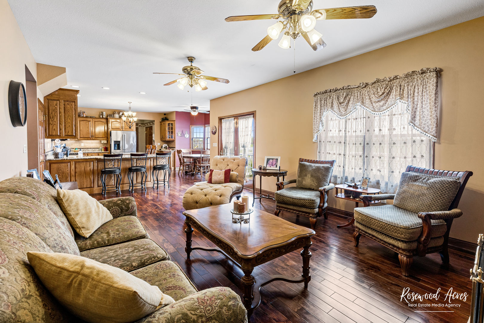 2021 Wiley Ridge Road Kankakee, IL 60901 - Photo 8 of 32 a living room with furniture kitchen view and a chandelier