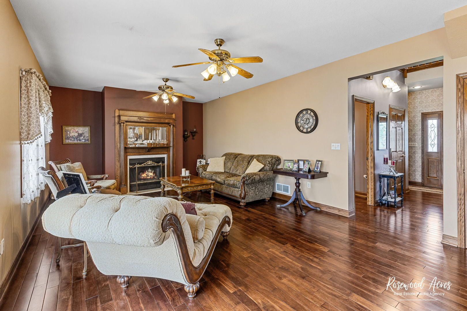 2021 Wiley Ridge Road Kankakee, IL 60901 - Photo 9 of 32 a living room with furniture a fireplace and a large window