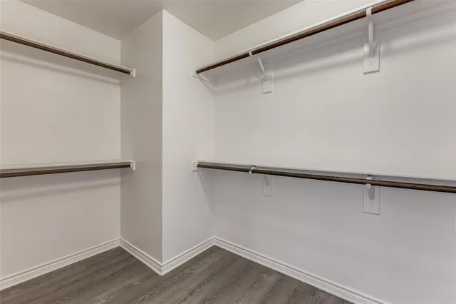 a view of an empty walk in closet