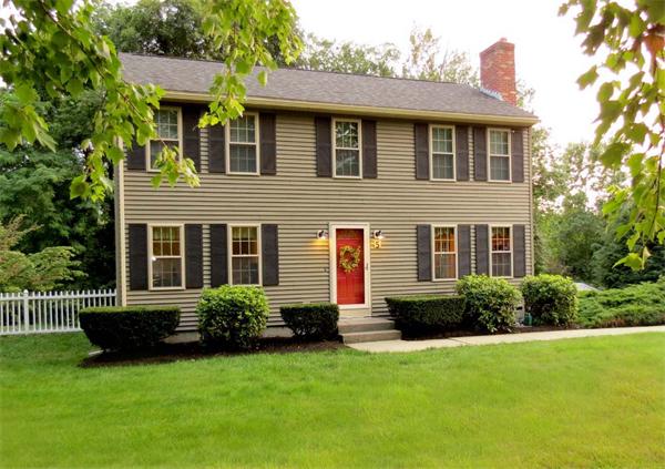 5 Houghton Road Sutton, MA 01590 - Photo 1 of 26 a front view of a house with a yard