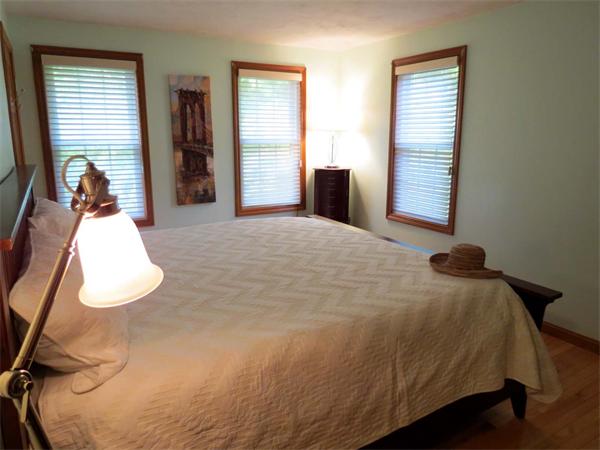 5 Houghton Road Sutton, MA 01590 - Photo 15 of 26 a bedroom with a bed and a dresser
