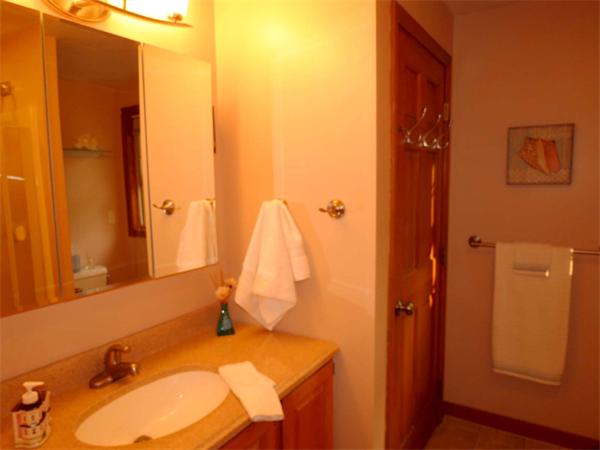 5 Houghton Road Sutton, MA 01590 - Photo 17 of 26 a bathroom with a sink and a mirror