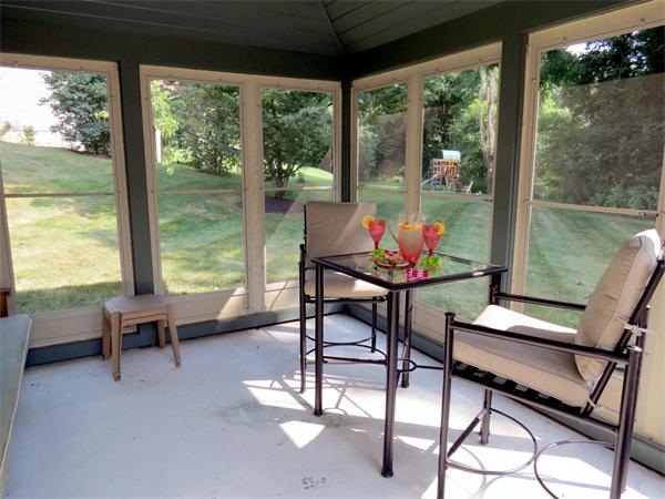5 Houghton Road Sutton, MA 01590 - Photo 20 of 26 a living room with furniture and a floor to ceiling window