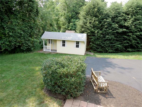5 Houghton Road Sutton, MA 01590 - Photo 25 of 26 a view of a house with a yard