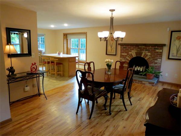 5 Houghton Road Sutton, MA 01590 - Photo 4 of 26 a dining room with furniture a chandelier and wooden floor