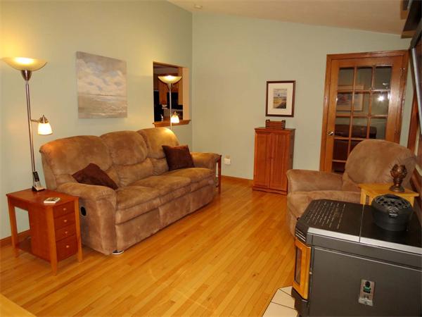 5 Houghton Road Sutton, MA 01590 - Photo 10 of 26 a living room with furniture and a flat screen tv