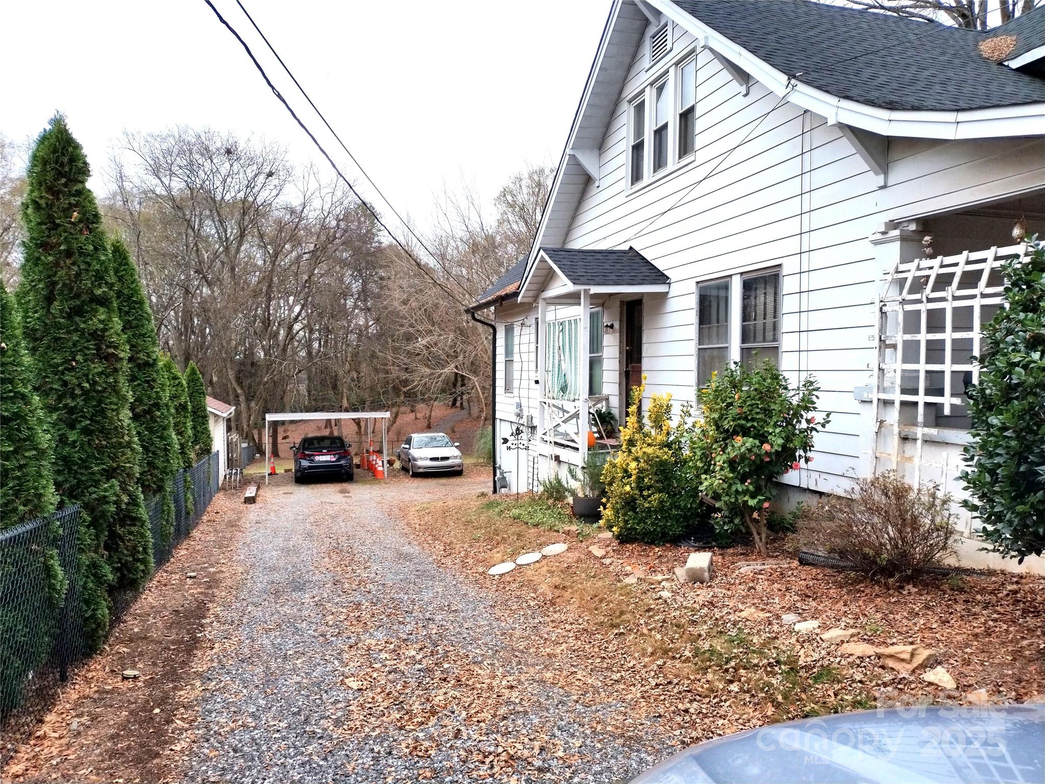 623 4th Avenue Southwest Hickory, NC 28602 - Photo 3 of 3 a view of a house with backyard and sitting area