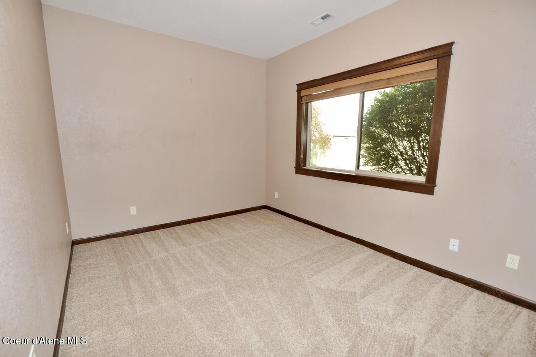 1315 Mordyl Loop Post Falls, ID 83854 - Photo 23 of 51 Mordyl 1315_front bedroom towards window