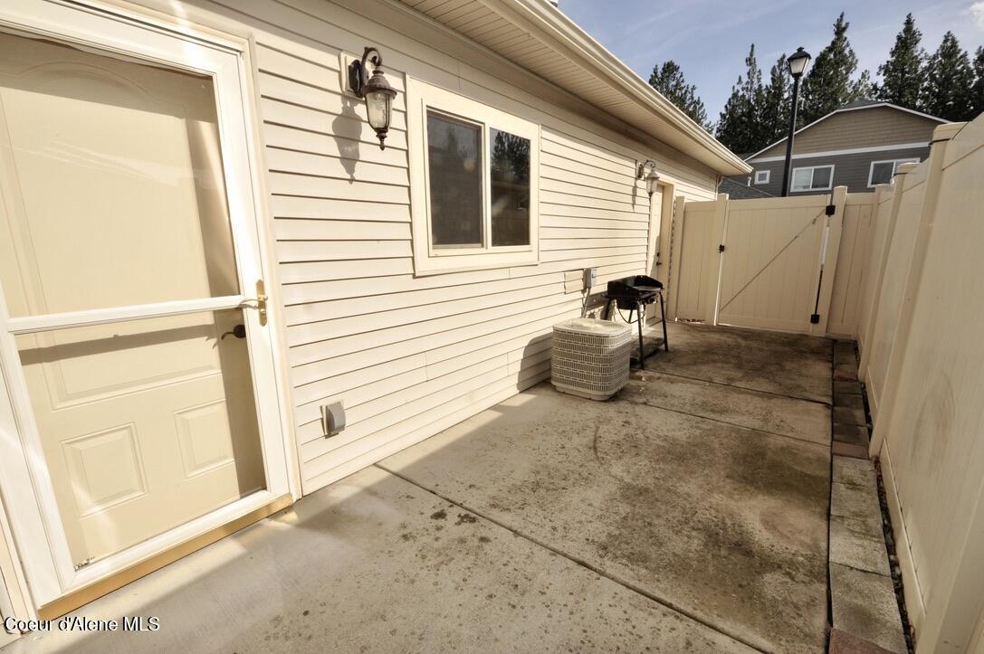 1315 Mordyl Loop Post Falls, ID 83854 - Photo 31 of 51 Mordyl 1315_patio towards ext door