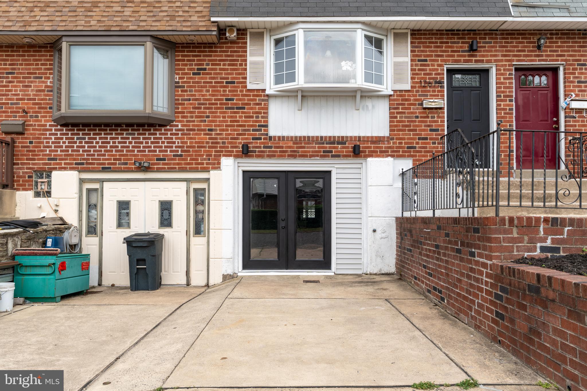 a front view of a house with a garage