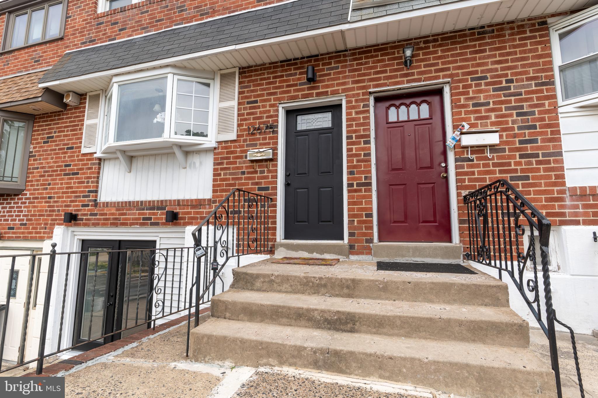 12675 Biscayne Drive Philadelphia, PA 19154 - Photo 2 of 50 a front view of a house with a porch