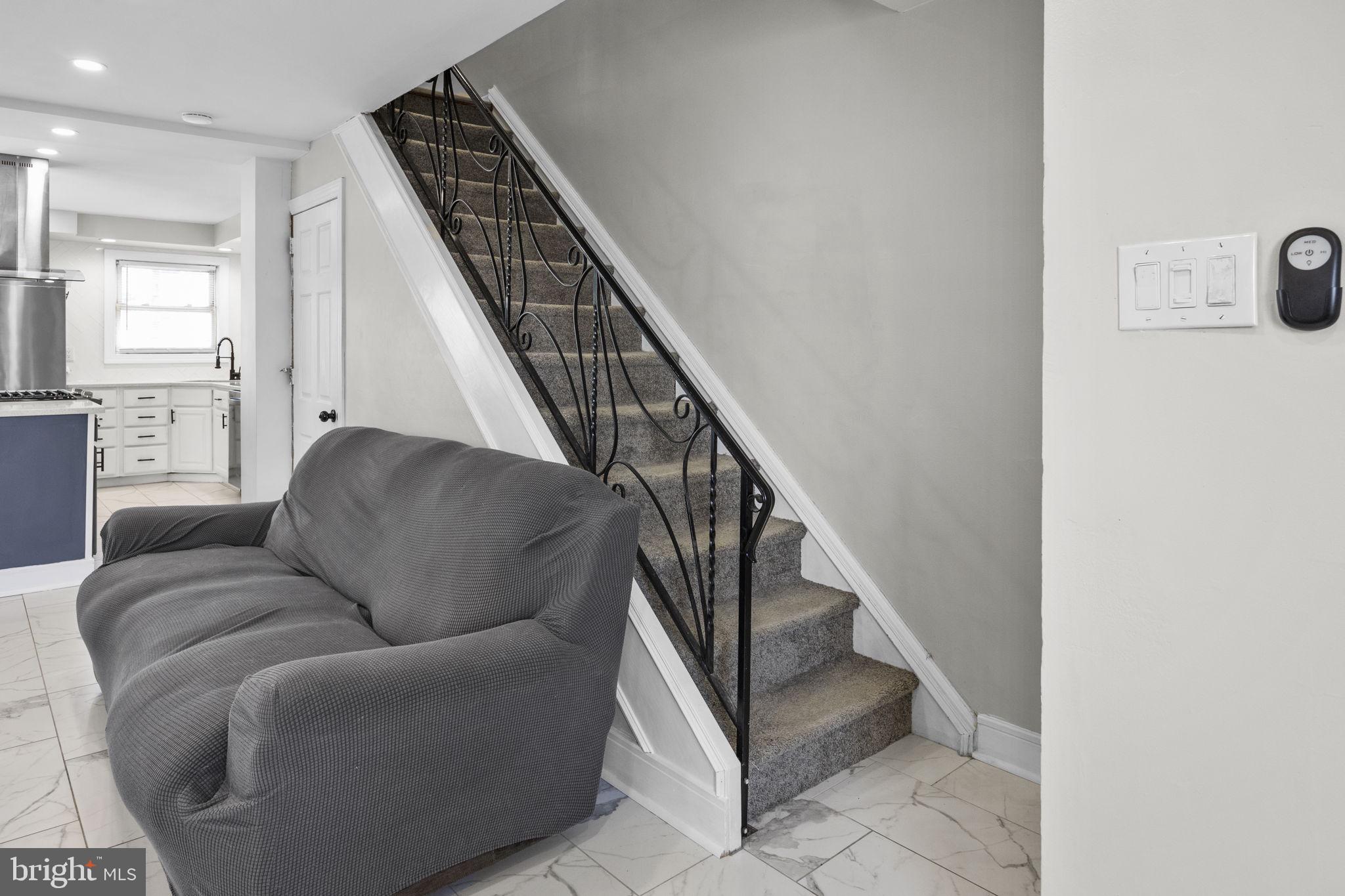 12675 Biscayne Drive Philadelphia, PA 19154 - Photo 23 of 50 a living room with furniture and stairs