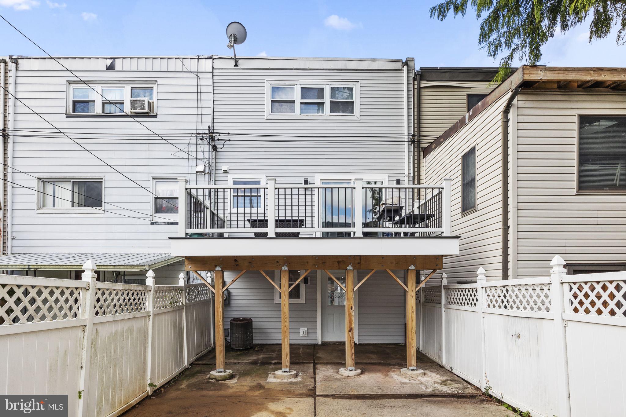 12675 Biscayne Drive Philadelphia, PA 19154 - Photo 28 of 50 a view of a balcony with furniture and floor to ceiling window