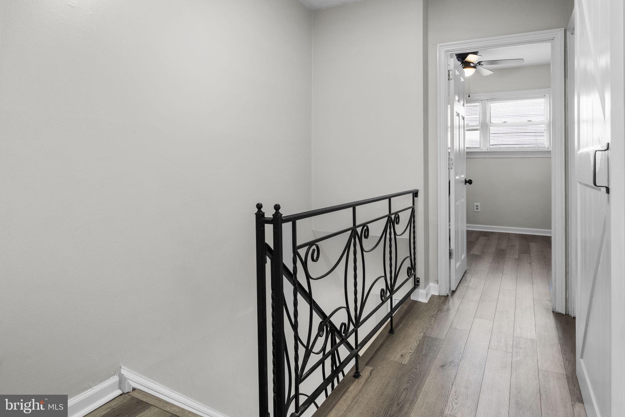 12675 Biscayne Drive Philadelphia, PA 19154 - Photo 32 of 50 a view of a hallway with wooden floor and staircase