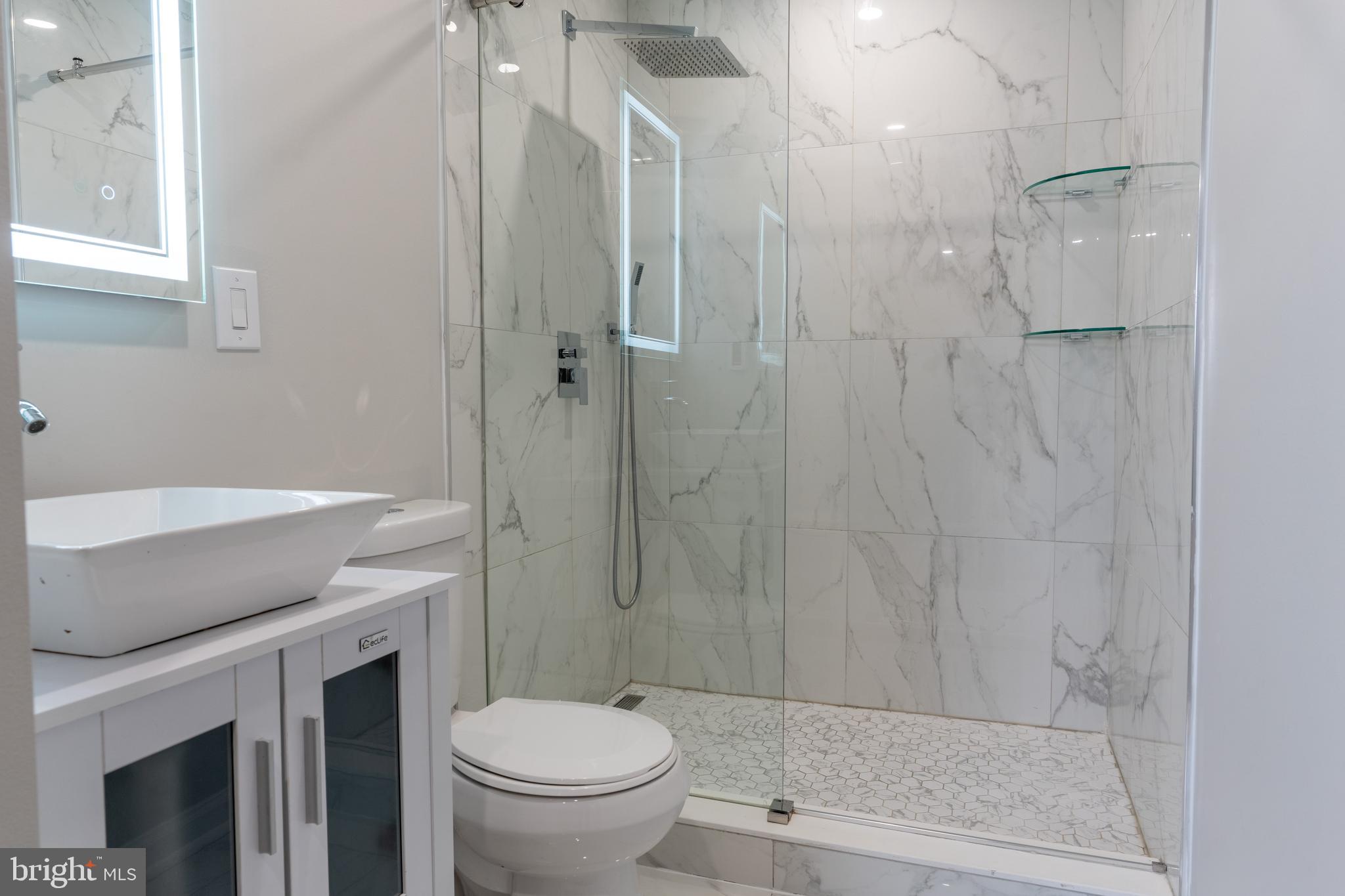 12675 Biscayne Drive Philadelphia, PA 19154 - Photo 39 of 50 a bathroom with a sink a toilet and shower