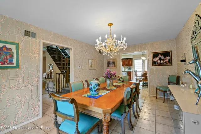 a kitchen with stainless steel appliances granite countertop a stove refrigerator sink and cabinets