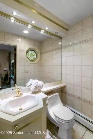 a bathroom with a sink and a toilet