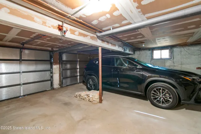 a view of green field with trees in the background
