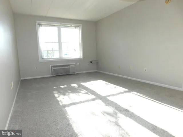 a view of a window in an empty room