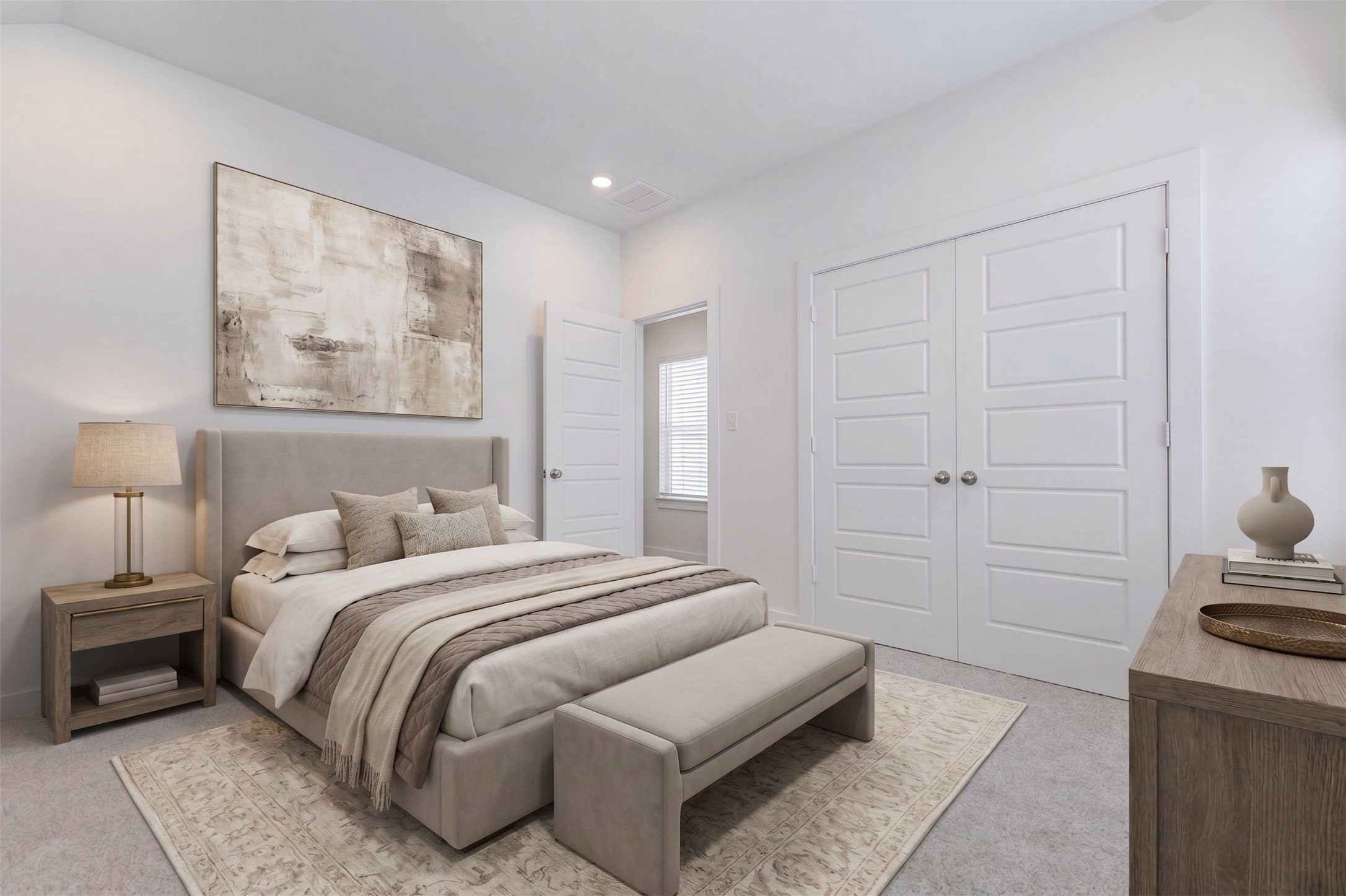 6471 Escondido Drive Rosharon, TX 77583 - Photo 6 of 33 Secondary bedroom with soft carpet, neutral walls, recessed lighting, and double closet doors for generous storage. The simple, bright design makes this room flexible for a guest bedroom, child’s room, home office, hobby space, or quiet study area.