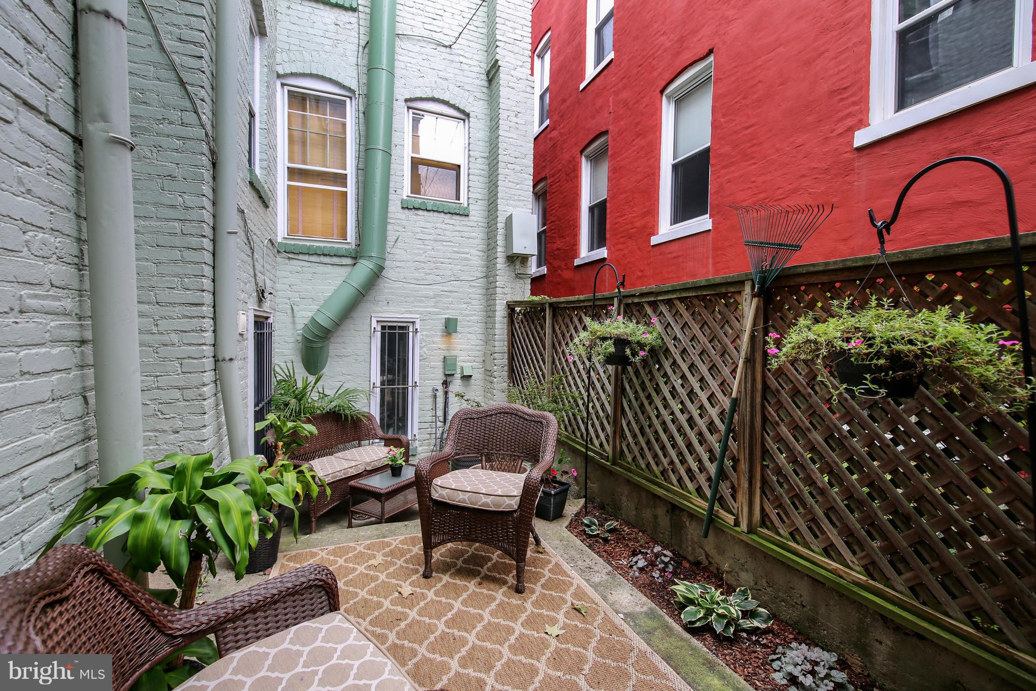 1816 T Street Northwest, Unit 4 Washington, DC 20009 - Photo 21 of 25 Courtyard along side of building