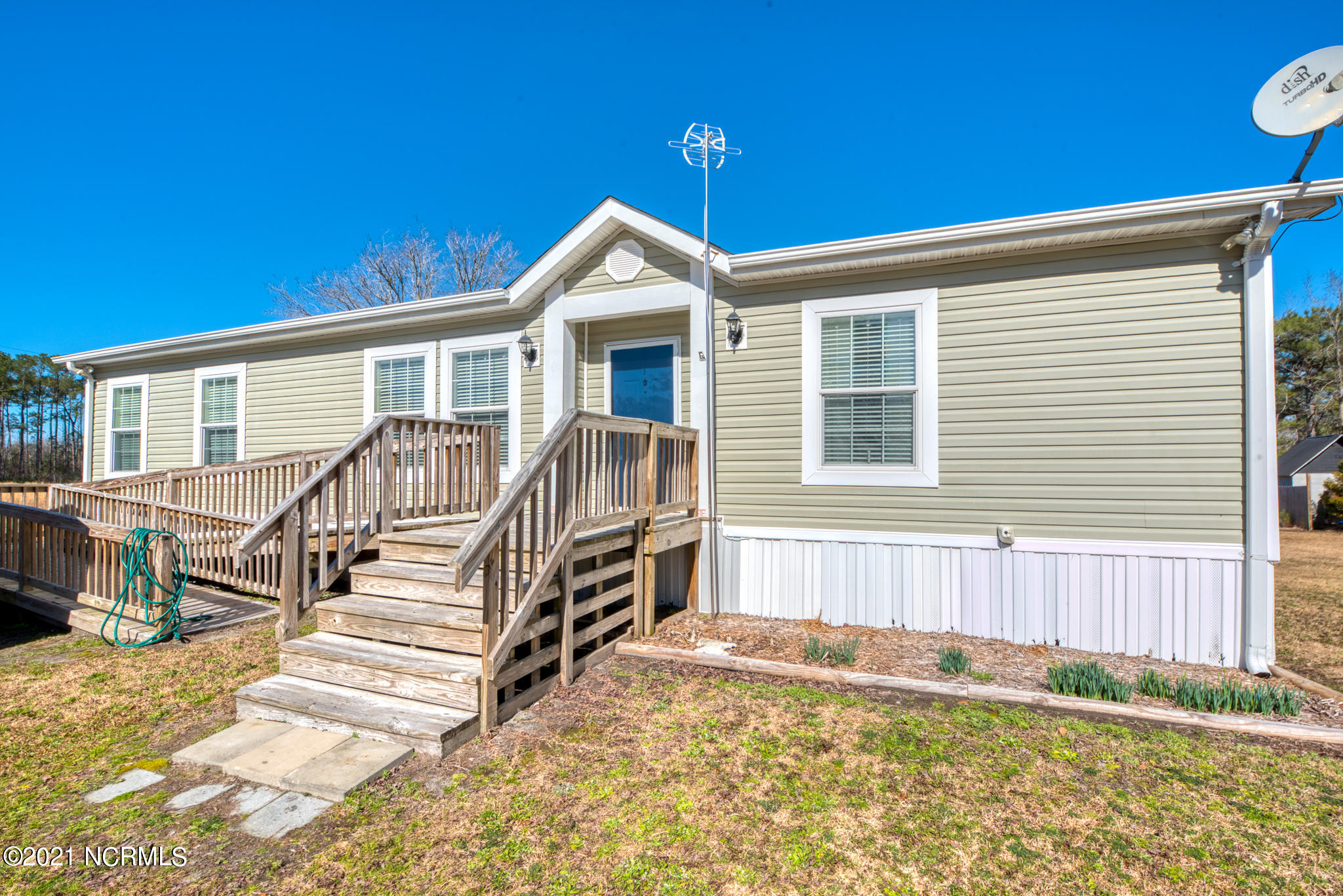 60 Gerainium Road Hampstead, NC 28443 - Photo 2 of 31 Front Outside View 2
